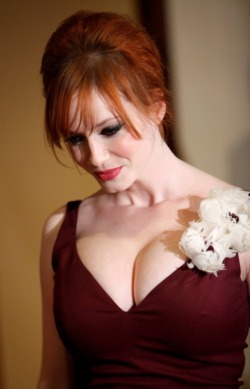 A simple dress turns into an event when worn by Christina Hendricks. Amazing.