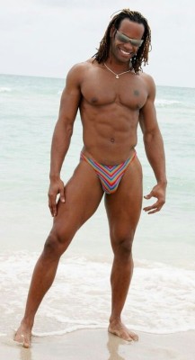 dominicanblackboy:  A hot moment on the beach with sexy gorgeous fat muscle ass Marlone Starr and that big fat deliciously yummy dick between his legs!😍😍😜😜