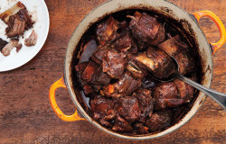 guttaman1: Red Wine-Braised Short Ribs Bon Appetit Magazine, bonappetit.com Pre­heat oven to 350°. Sea­son short ribs with salt and pep­per. Heat oil in a large Dutch oven over medium-high heat. Work­ing in 2 batch­es, brown short ribs on all sides,