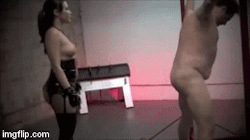 Asian mistress kicking her white pig from behind