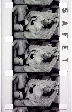Cherrie Knight is featured in frames from an 8mm Burlesque short, entitled:  “SAILOR’S PARADISE”..More pics of Cherrie can be found here..