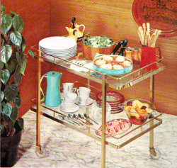 danismm:    Vintage Tablescapes     Knowing the pre-WW II designs and styles I can see how something like this in the 50′s would have been very attractive.  It is an outgrowth of the modernism you see in design genres like Art Deco and Arts and Crafts. 