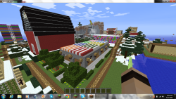 My town of Everdeen &lt;3 The striped roof is the new market! Shopowners may keep a stall, and set a home there to sell supplies in my town! In the back near the gingerbread cafe is Charlie the Unicorn coming out of the mountain. That big red barn is