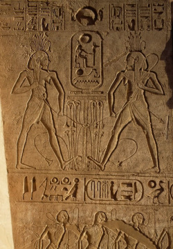 grandegyptianmuseum:    Union between Upper and Lower Egypt and cartouche of Pharaoh, relief on base of thrones, Temple of Ramesses II, Abu Simbel.  Unification