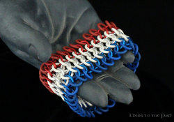 links-to-the-past:  Have you seen our handmade chainmail cuffs designed after country flags? Each cuff is made using anodized aluminum and latex-free rubber, and is stretchy with no clasp. Currently, we have cuffs featuring the colors of the the American