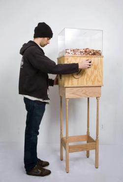 darreninfinity:beavercop:melleigh:  This machine allows anyone to work for minimum wage for as long as they like. Turning the crank on the side releases one penny every 4.97 seconds, for a total of ů.25 per hour. This corresponds to minimum wage for