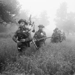awhodareswinsfan:  Led by their piper, men of 7th Seaforth Highlanders, 15th (Scottish) Division advance during Operation ‘Epsom’, 26 June 1944. (IWM)
