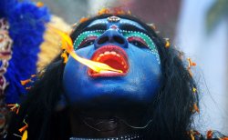 artofprayer:  An Indian woman dressed as the Hindu goddess Kali appeared to breathe fire in a Ram Navami procession in Allahabad. The festival celebrates the birthday of Lord Ram. 