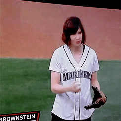 subpop:  Sleater-Kinney’s Carrie Brownstein throwing out the first pitch at the Seattle Mariner’s May 9th game against Oakland. Watch out, Tim Wakefield. 