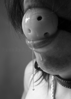 Nothing like a ball gag to make a whore drool (except perhaps a nice big cock) the perfect precursor to a sloppy throat fucking session.
