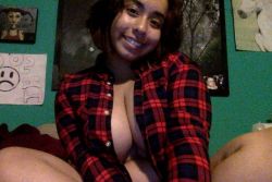 MishaSilass has a beautiful smile and great cleavage.