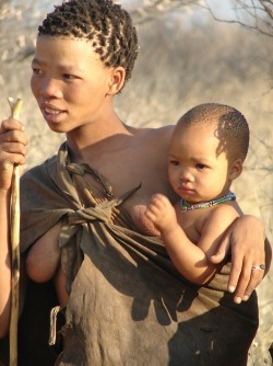 beautiesofafrique:San woman with her child, Botswana   Oldest culture on the planet