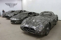 blazepress:  50 Artists Visit a Polish Scrapyard to Build Recycled Metal Supercar Collection 