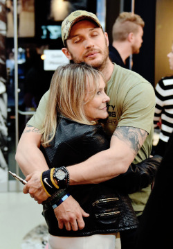 kinghardy:  One of my all-time favorite pictures of Tom Hardy with his beloved agent, Lindy King. Of which he has a tattoo dedicated to her:On his arm, the name of his agent - Lindy King - along with a little crown. “I said ‘if you ever get me into