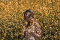 openbooks:  @junestpaul feigning innocence in a field of mustard flowers.Malibu, CA. April 1, 2017