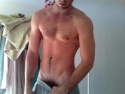 hunkguys:  (via TumbleOn)  A guy half naked in sweats with a treasure trail. Omg i want him.