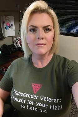 gaywrites:  Carla Lewis, a 44-year-old trans woman in Tennessee who served in the U.S. military, shared this photo on her Facebook recently. The photo says it all. (via the Huffington Post)[Image: A selfie of a woman with short blonde hair and a serious