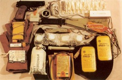 atlasobscura:  appendixjournal:  A Soviet cosmonaut’s survival kit, including: - flotation suit - emergency beacon and signal device - mittens - TZK-14 cold weather suit - fishing tackle - Makaraov pistol with cartridges Apparently firearms remain part