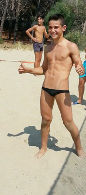 slip2015:  Sexy boy plays beach volley in hot black skimpy speedo without shame !