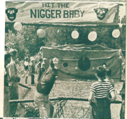 thesunatmidnight2:   At the end, thirty feet or so from the counter that closed the entrance, a grinning Negro face bobbed and grimaced through a hole in the back curtain painted to represent a jungle river. The Negro’s head came right out of the spread