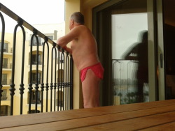 On a balcony of the Hilton, Malta, 30 November 2014. Short shorts a definite no-no away from beaches / pools - so it took considerable nerve to venture out for a couple of hours and flash thighs and butt cheeks around densely populated St Juliens and