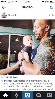 ramblingsofacuriousfangirl:  Can we just take a moment to appreciate the cuteness of this picture?  Dwayne is thinking ‘Damn! I’m holding this baby like a pro…’ While the baby is thinking ‘Damn this guy is huge….must not look directly at the