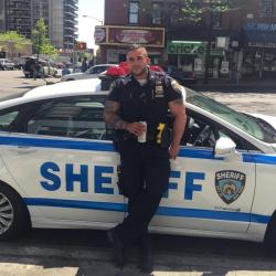 hyper-masculine:    New York City Sheriff’s Deputy Miguel Pimentel [article link] Hot New York City Cop Goes Viral 