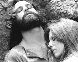 jim-morrison-lizardies-deactiva:  “They were like Romeo and Juliet. They fought like hell, but they were meant to be together”. -John DensmoreJim Morrison &amp; Pam Morrison, photographed by Edmund Teske, 1969. 