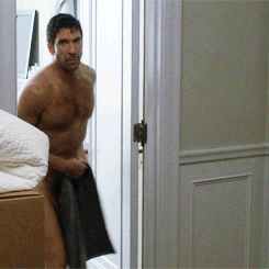 davidmuhn:  Dylan Mcdermott walking around covering his crotch with a towel gif