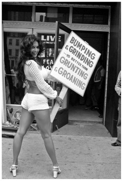 burleskateer: BUMPING &amp; GRINDING  is better than  GRUNTING &amp; GROANING Vintage 70′s-era press photo shows dancer Ronnie Bell protesting in front of NYC’s ‘Mayfair Theatre’.. A 2-act play entitled “Fear Of Love” was being presented,