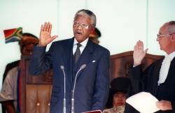 breakingnews:  Nelson Mandela dies at 95 Former South African President Nelson Mandela has died, President Jacob Zuma announced Thursday. See more at Breaking News.  Photo: Mandela takes the oath on May 10, 1994, during his inauguration in Pretoria as