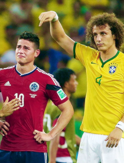 The World Cup /  David Luiz of Brazil consoles James Rodriguez of Colombia after Brazil’s 2-1 win during the 2014 FIFA World Cup Brazil Quarter Final match between Brazil and Colombia at Castelao on July 4, 2014 in Fortaleza, Brazil 