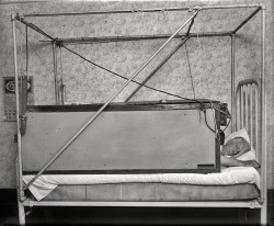 Washington man sleeps in a blanketless bed, 1927. Milton Fairchild of Washington, D.C., does not need any blankets for keeping him warm these winter nights. He has invented an electrical bed which does not require any covering for the body when asleep.