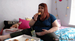 woodsgotweird:  Peek-a-Boo Belly Pizza Stuffing!   Wood is back and at her fattest ever! She was recently challenged by one of her fans to do a stuffing in one of her newly outgrown shirts and see if she could make it ride up over her belly button just
