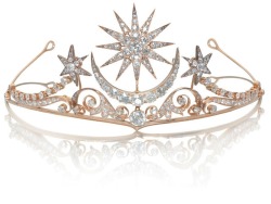 mote-historie:  Moon and stars diamond tiara, circa 1900.     The central sunburst and crescent moon motifs above a large cushion-shaped diamond, on a scrolling frame of shooting stars, set throughout with old brilliant-cut diamonds, mounted in gold,