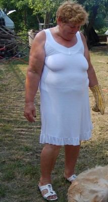 gilfsnmilfs:  Stunning Grandma Braless. I love that dress the way it shows off her voluptuous Body, her curves and those magnificent free tits! Definitively a Grandma to be deeply fucked! 
