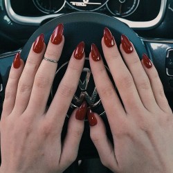 Red Nails on We Heart It - http://weheartit.com/entry/166317343