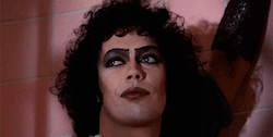 iambettyjean:  Jealous Frank is not amused with your singing, Eddie. Tim Curry as Frank N. Furter - The Rocky Horror Picture Show (1975) 