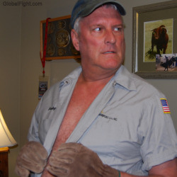 wrestlerswrestlingphotos:  handsome rugged trucker daddy opening shirt