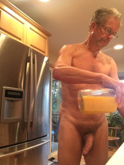 pnw007:  LIVING EVERYDAY NUDISM:   Good morning.  Pouring  my orange juice as another naked day begins after just rolling out of bed 
