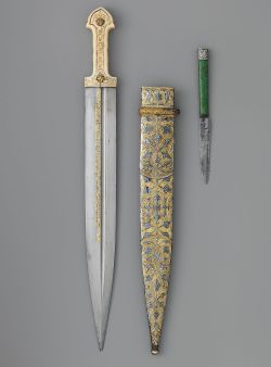 art-of-swords:  Qama Dagger with Sheath and Knife Dated: dated, 1856–57, 1861 Culture: Caucasian Medium: steel, bone, silver, gold, shark skin, ivory, niello, iron Measurements: Dagger (a); L. with sheath 19 ¼ in. (48.9 cm); L. without sheath 19 1/16
