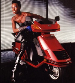 thunderandthrottle: Nothing says 80s like Grace Jones on a Honda Elite.