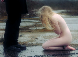 thoughtsofasubgirl:  This is such a beautiful photo. she is at her lowest. Dirty, cold, naked and kneeling. Yet He is there. Always close by because a Master knows how to use and push His property but love and care for her as well. 