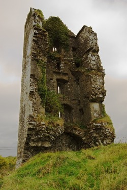Cloondooan Castle ruins, Ireland - A partially-ruined 16th-century castle, or tower house. It had been a fortress of great strength. In A.D. 1586, The castle was under seige and Mahon, the owner, was killed. His people surrender and the western side of