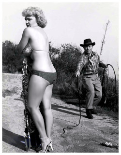 burleskateer: WHIP TEASE Jennie Lee appears in the pages of the December ‘54 issue of &lsquo;TAB’; a popular Men’s Digest.. She’s shown losing various articles of her clothing from a 15-foot bullwhip wielded by expert handler: Dave Kashner.. 