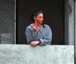 r-edtape:  sandundsiebdas:  Actress Gemma Arterton on a break during the filming of ‘Byzantium’. She went out to the balcony for a smoke and forgot to clean the fake blood off her face. Awesome.   Me af