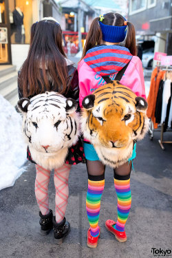 tokyo-fashion:  Japanese sisters Yurika and Mizuho on Takeshita Dori in Harajuku with tiger backpack and fashion from Candy Stripper, WEGO, Romantic Standard &amp; Swimmer. Full Looks