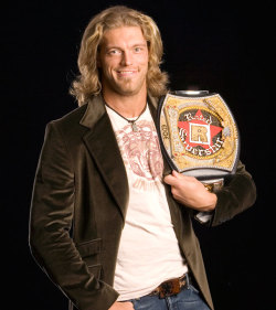 fishbulbsuplex:  WWE Heavyweight Champion Edge  The only time I liked that ridiculous title was when he customized it.