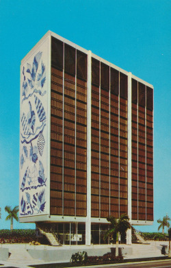 cardboardamerica:  Bacardi Imports, Inc. Building - Miami, FloridaCommands a breath-taking view of Miami, and Miami Beach. This beautiful, ultra-modern structure, overlooking beautiful Biscayne Bay, is the new national headquarters for Bacardi Rum.