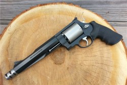 gunrunnerhell:  Smith &amp; Wesson Model 500 Performance Center Custom shop version of Smith &amp; Wesson’s infamous big bore revolver. Noticeable differences are the barrel, new style compensator, unfluted cylinder and a black finish. Although it does